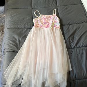 This is a beautiful dress that was only worn ONCE!